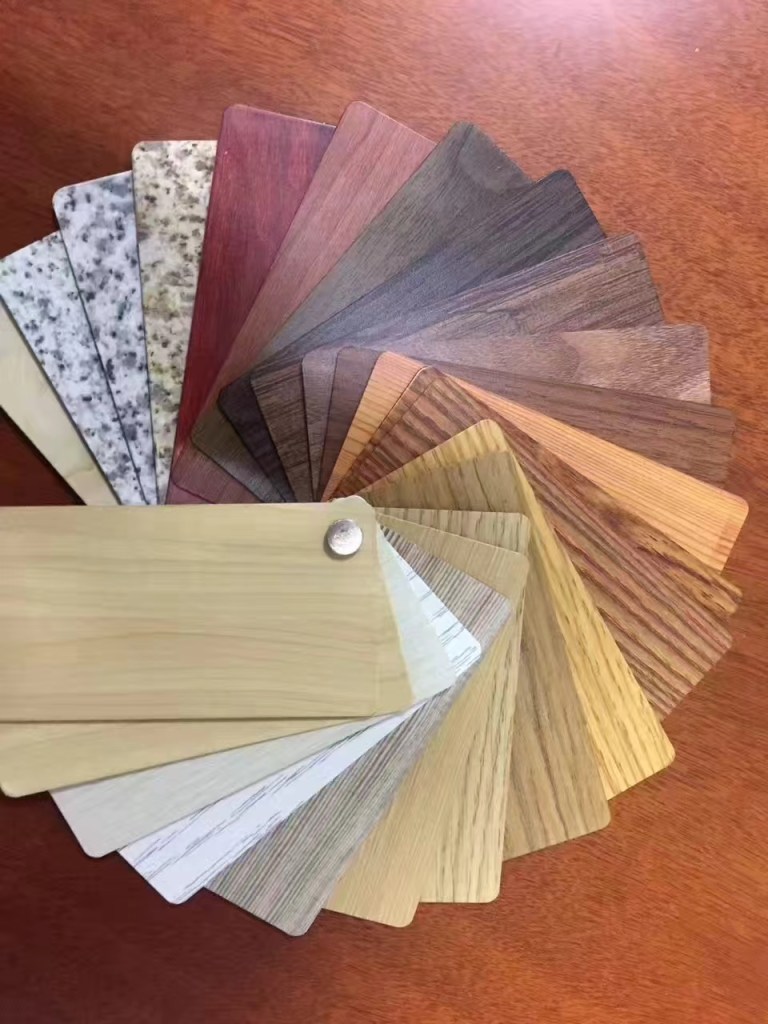 Colored stainless steel color samples in various decorative finishes