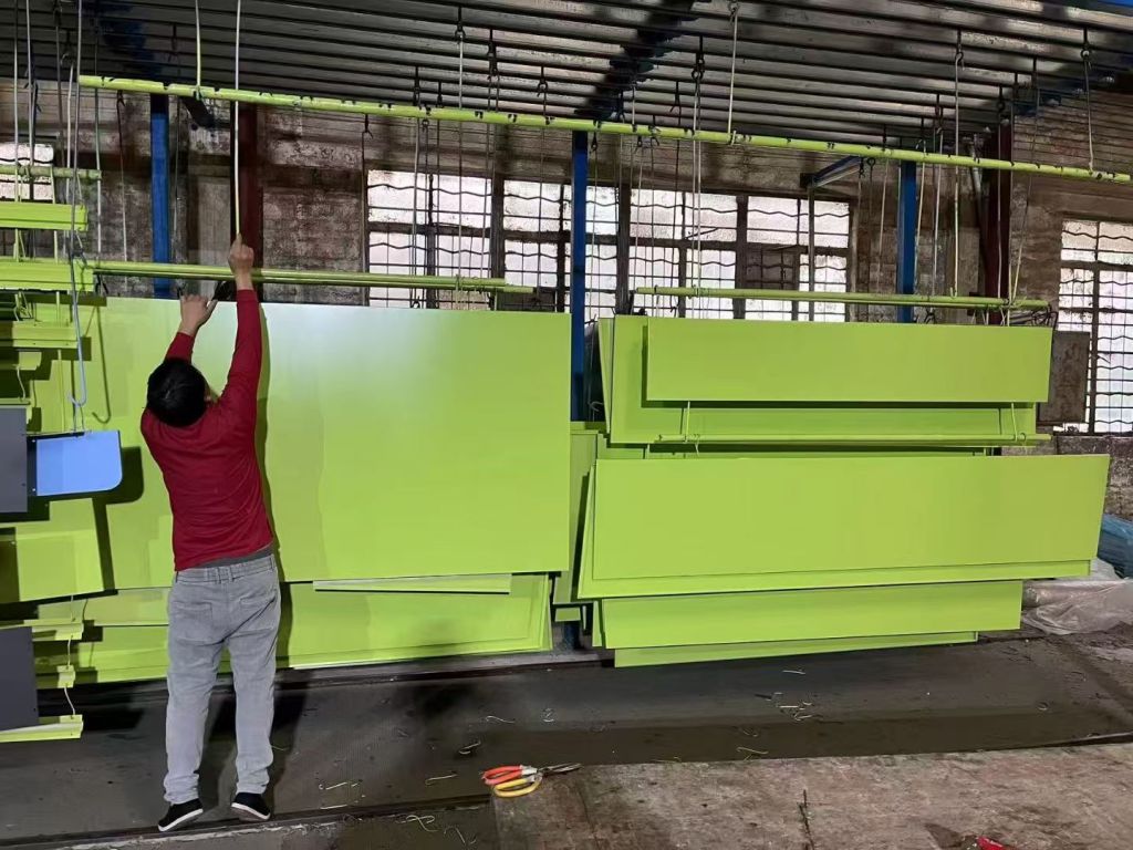 Green powder-coated fabricated metal panels