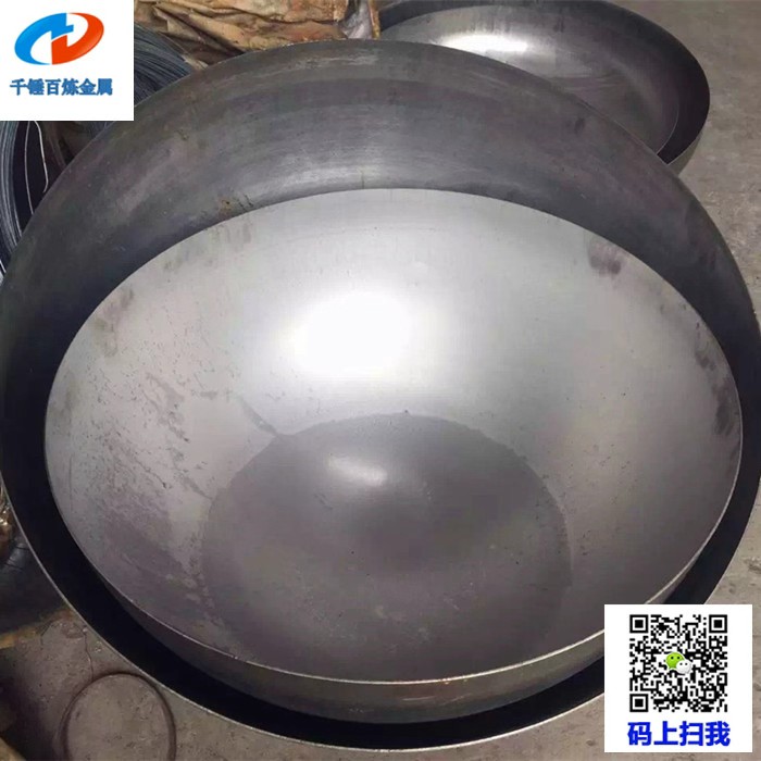 Stainless steel hemispherical head with a deep half-spherical curved profile, manufactured as a formed end closure for pressure vessels and tanks.