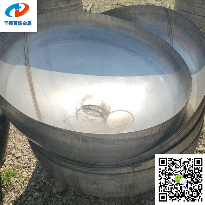 Stainless steel hemispherical vessel head with a continuous half-spherical profile and circular opening, designed for pressure vessel and tank applications.